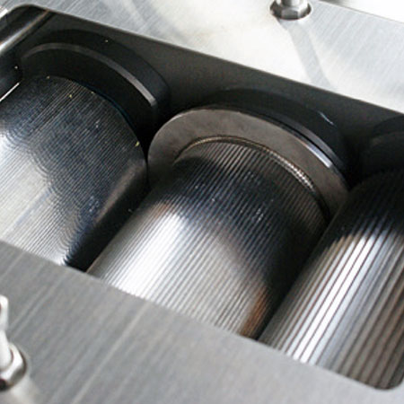 Six stainless steel rollers in one machine.