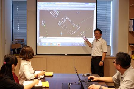 R&D engineers were discussing an OEM project with sales team.