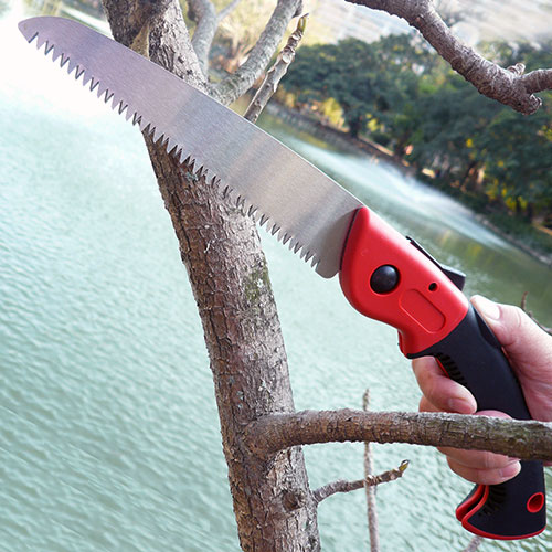Hand-held Folding Saw for Cutting Through Dry and Green Wood