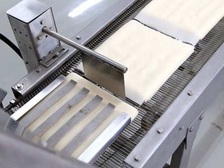 Wrappers are stacked to facilitate the packaging process