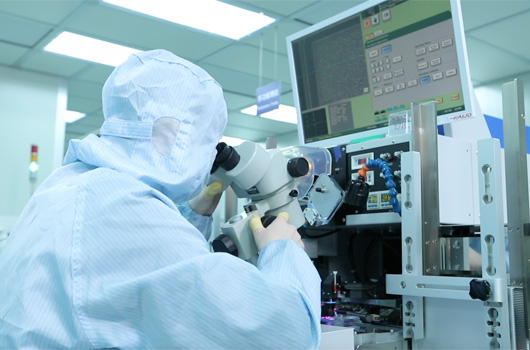 QC engineers in one of our 1K grade cleanrooms
