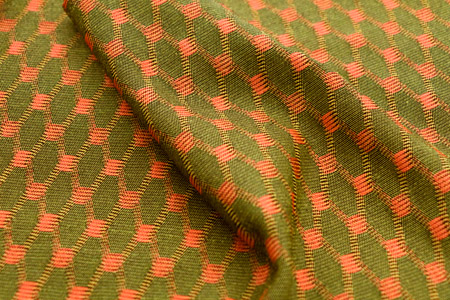 Knit & Woven Functional Fabric - Knit jacquard creates pattern variation.