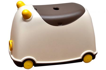 Tow-along BuBu moveable toy storage bin for children in brown.