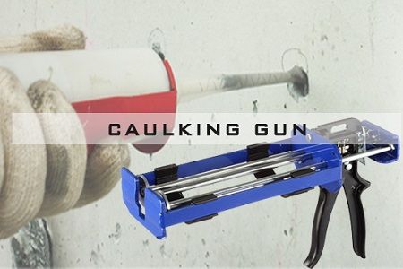 Dual cartridge caulking gun