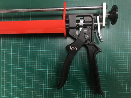 Branding on manual caulking applicator trigger