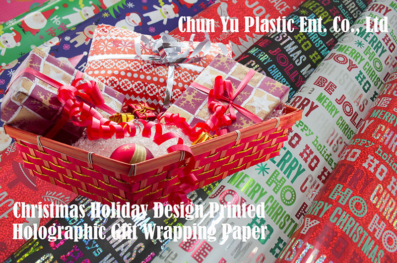 Gift wrapping paper with Christmas designs printed for holiday season.
