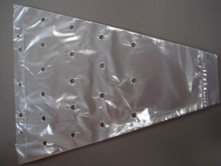 Biodegradable CPP Plant Sleeve with air holes punched.