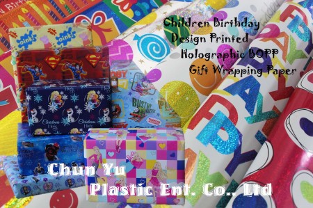 CHILDREN BIRTHDAY HOLOGRAPHIC BOPP GIFT WRAPPING PAPER - Holographic BOPP gift wrapping paper printed with fun and cute designs for children and birthday parties.
