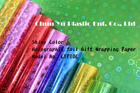 Holografisches Papier mit farbig bedrucktem Geschenkpapier - Farbig bedrucktes holografisches Geschenkpapier in Rolle und Bogen