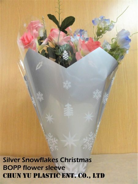 wrapped bouquet in silver Snowflakes Christmas BOPP flower sleeve