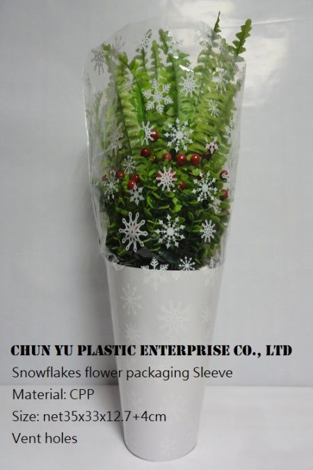 Modèle n° : Snowflakes CPP Flower Packaging Sleeve 14 - White Snowflakes CPP Flower Sleeves est utilisé pour emballer les plantes à feuillage