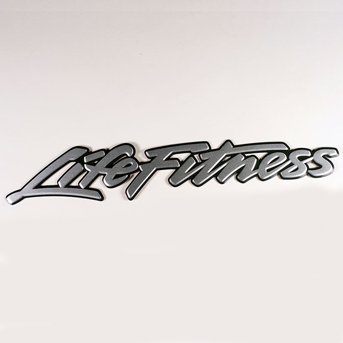 Fitness equipment label - Metal plate lettering.