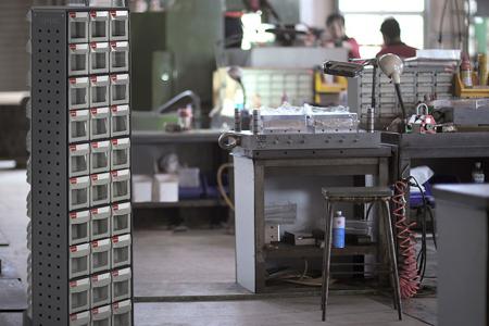 Rotational and Cart-Style Quick Flip Out Bins - Revolving tower fitted with flip out bins for accessible workplace storage.